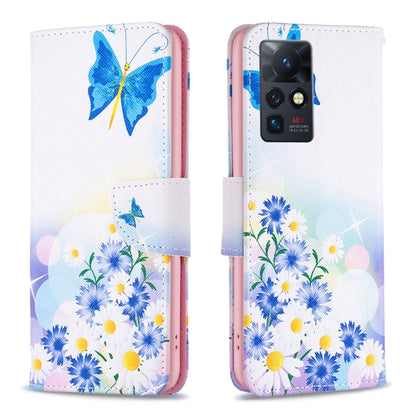 Leather-style phone wallet case with butterfly and blue daisy floral illustration, magnetic flap.