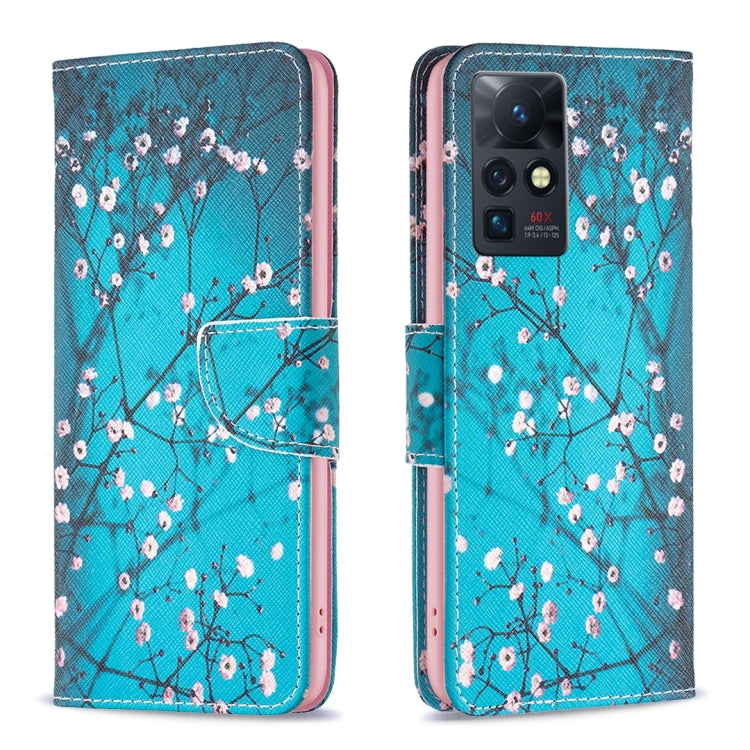 Leather-style phone wallet case with cherry blossom branch pattern and magnetic flap.
