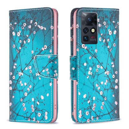 Leather-style phone wallet case with cherry blossom branch pattern and magnetic flap.