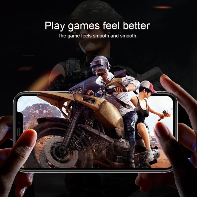 Tempered glass screen protector film on smartphone screen held in hands