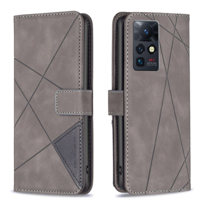 Grey rhombus leather-look folio case with magnetic buckle; camera cutout visible