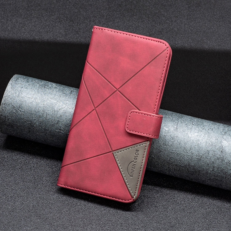 Red rhombus texture leather flip phone case with magnetic buckle, front angled view