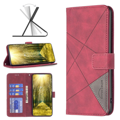 Red rhombus-texture flip leather phone case with magnetic buckle and card pocket.