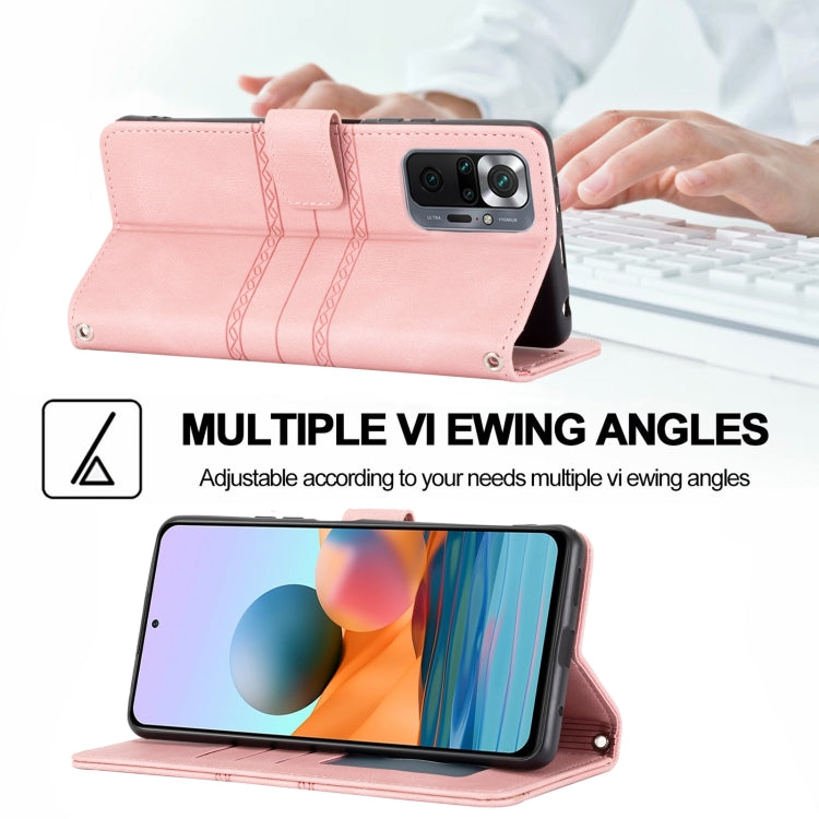 Pink magnetic flip phone case with stand and embossed striped front flap