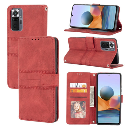 Red embossed striped magnetic flip phone case with card slots and stand