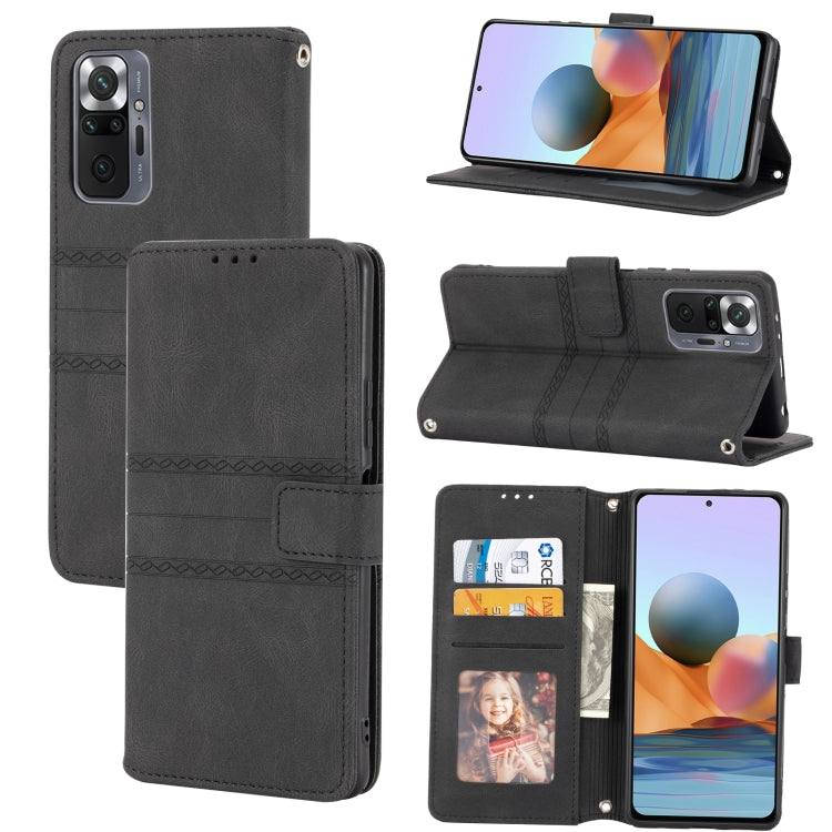 Black embossed striped magnetic flip leather phone case with card slots and stand.