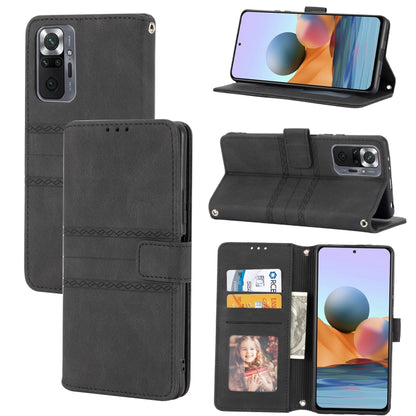 Black embossed striped magnetic flip leather phone case with card slots and stand.