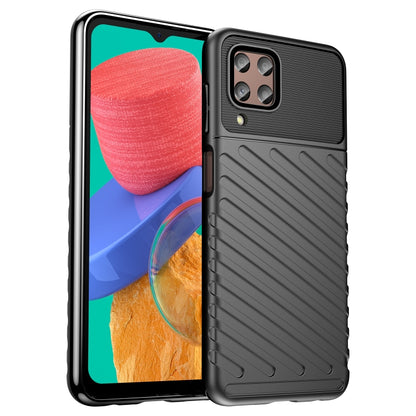 Black shockproof TPU phone case with ribbed back and camera cutout, front phone visible