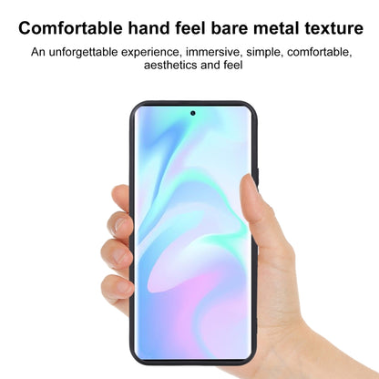 Black TPU phone case held in hands, with camera and speaker cutouts