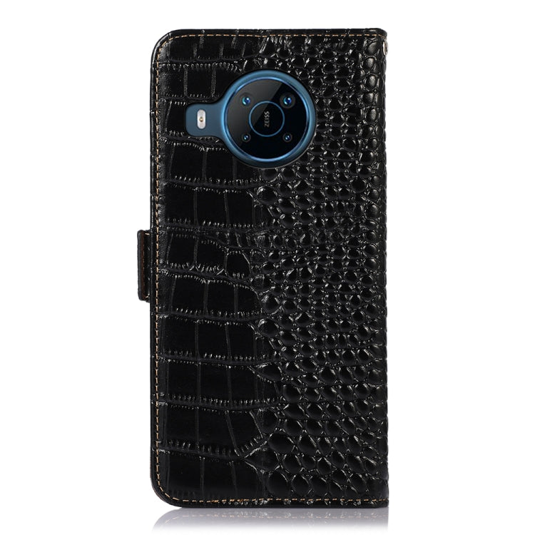 Black crocodile-texture leather flip phone case with camera cutout