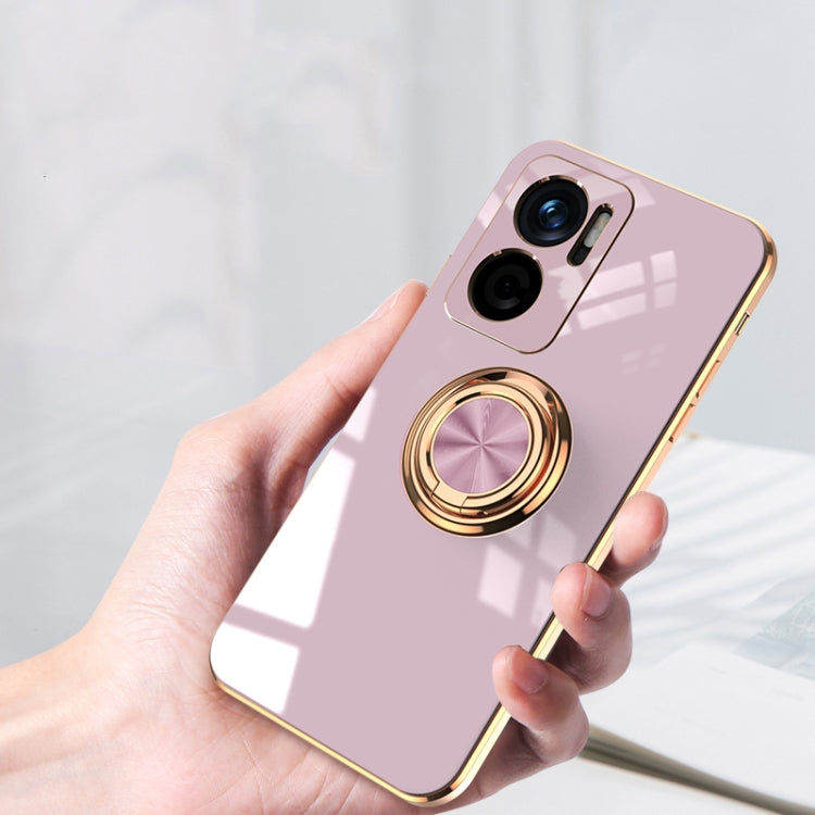 Light pink silicone phone case with magnetic ring holder and camera cutouts