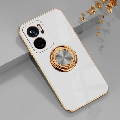 White phone case with gold magnetic ring holder and camera cutouts