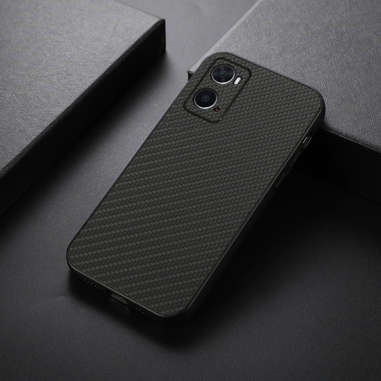 Black carbon fiber texture phone case with dual camera cutouts, angled view
