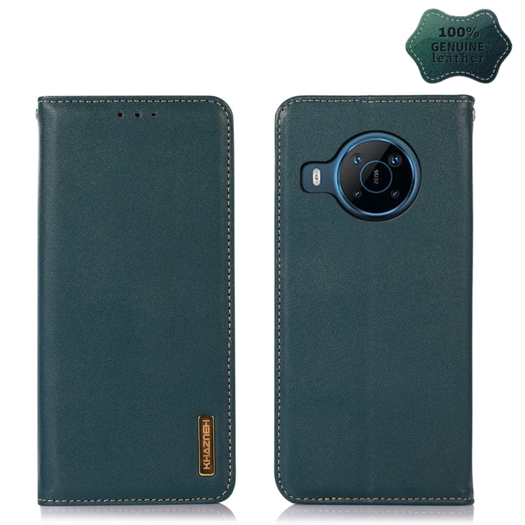 Green leather wallet phone case with camera cutout and stitched edges.