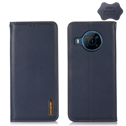 Genuine leather wallet-style phone case, dark blue, with round camera lens cutout