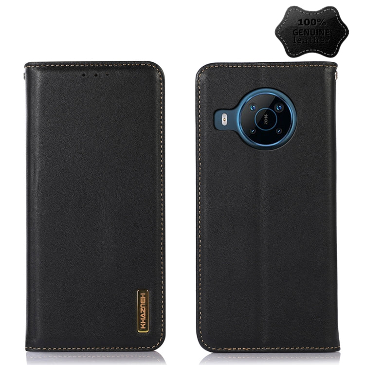 Black leather phone case with stitched trim and circular camera module cutout.