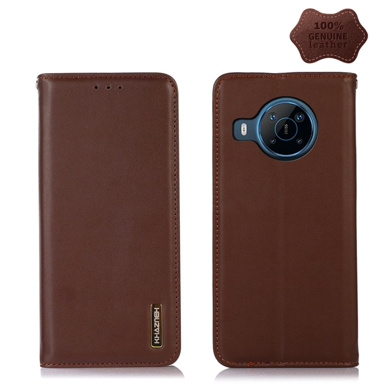 Brown nappa leather phone case with stitched edges and camera cutout on back