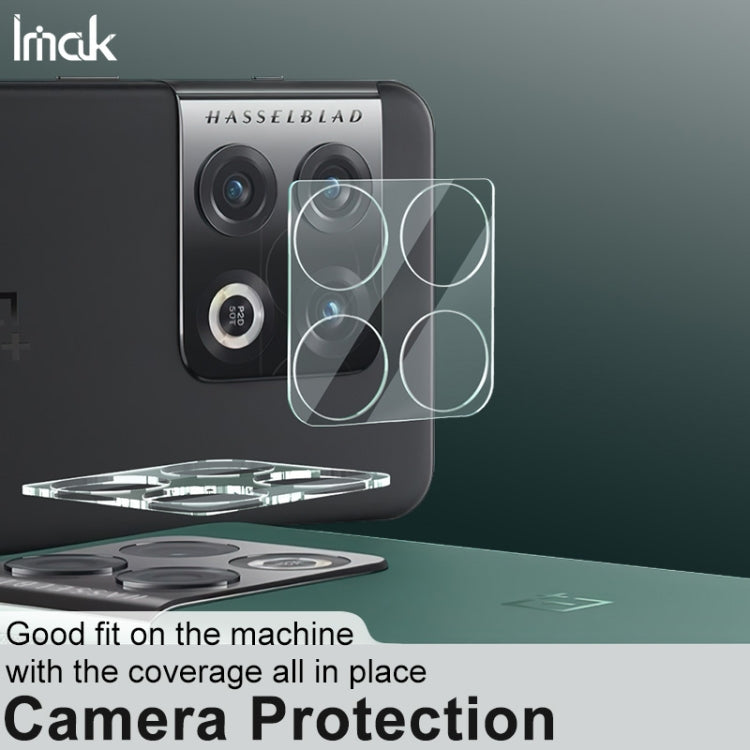 Rear camera protection tempered glass film overlay on phone camera module, clear cutouts