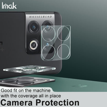 Rear camera protection tempered glass film overlay on phone camera module, clear cutouts