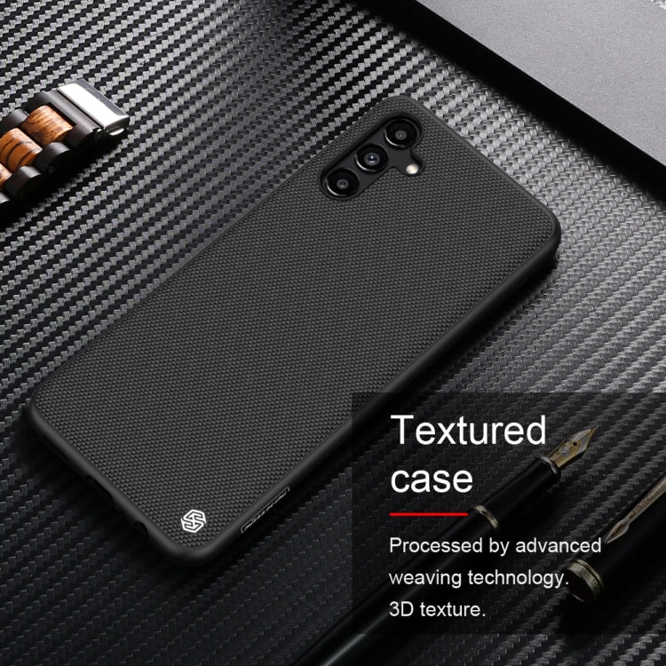 NILLKIN textured nylon-fiber phone case close-up with camera bump cutouts