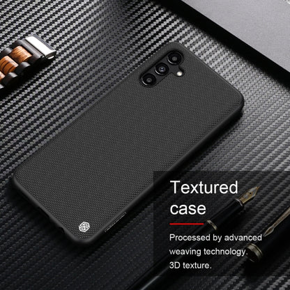 NILLKIN textured nylon-fiber phone case close-up with camera bump cutouts