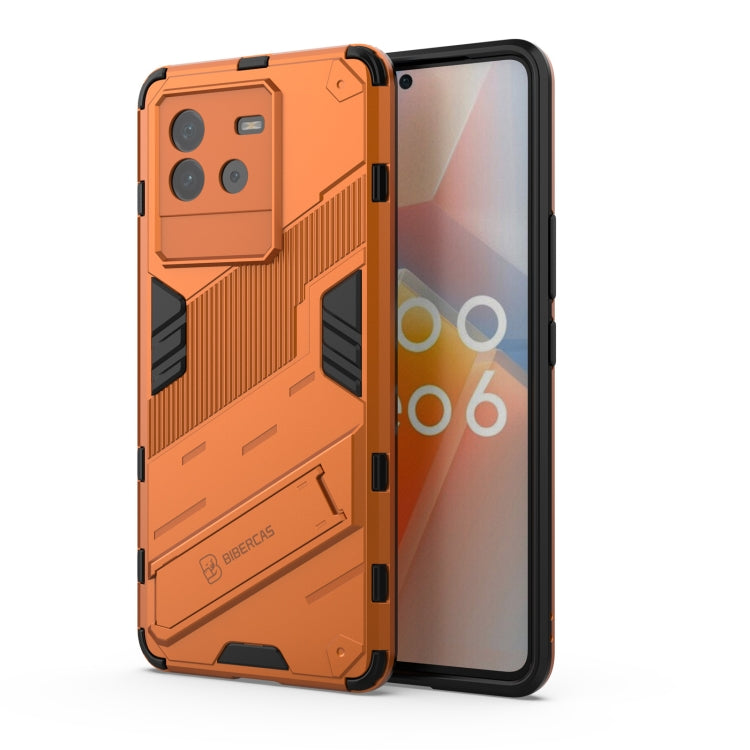 Orange armored PC + TPU phone case with holder for vivo iQOO Neo6 5G
