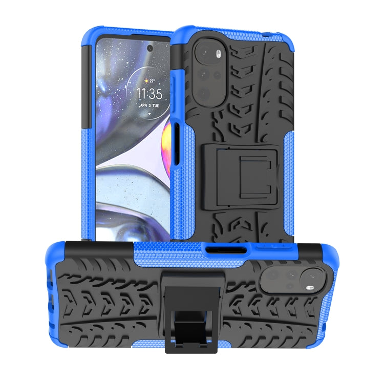 Blue tire-texture TPU+PC phone case with built-in holder, raised edges, camera protection
