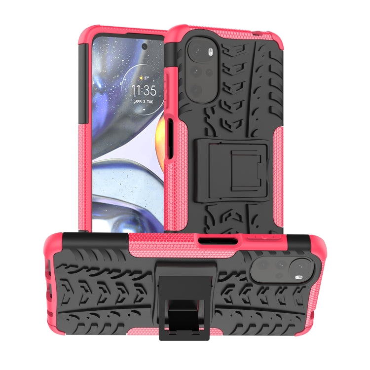Red and black textured phone case with built-in holder and raised camera frame