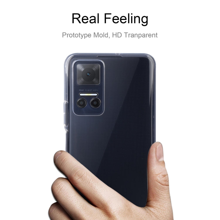 Transparent TPU phone case held in hand, showing camera cutouts