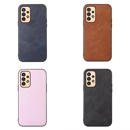Cowhide-texture PU phone cases set in dark, brown, and pink with camera cutouts