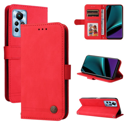 Red leather folio phone case with metal button, card slots, and kickstand.