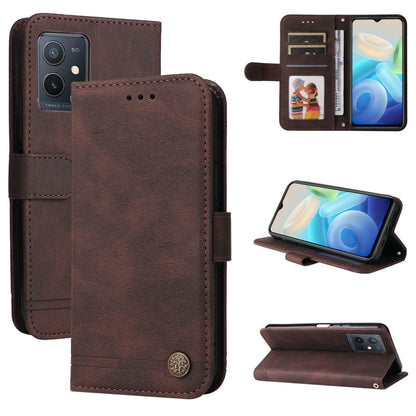 Brown leather folio phone case with card slots, metal button, and kickstand
