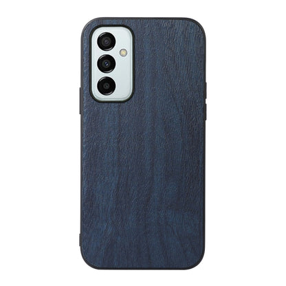 Wood-texture PU phone case, dark blue, with camera cutouts and textured finish.