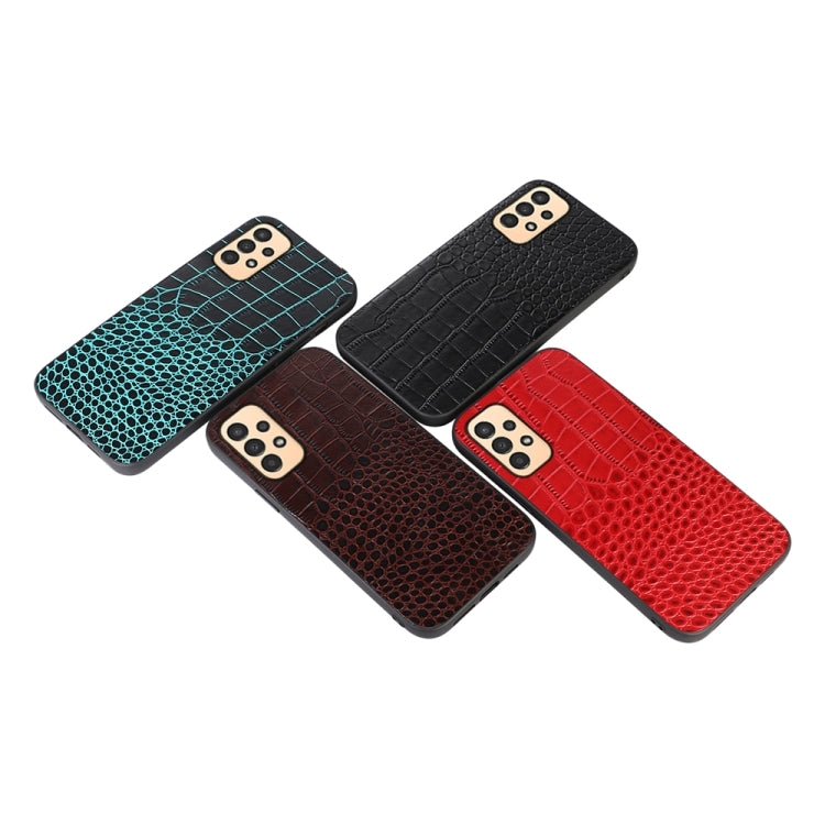 Crocodile-textured leather phone cases in teal, brown, black, and red