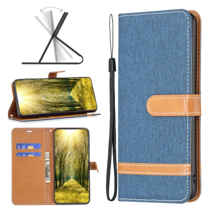 Dark blue denim-texture leather folio phone case with wrist strap and card slot