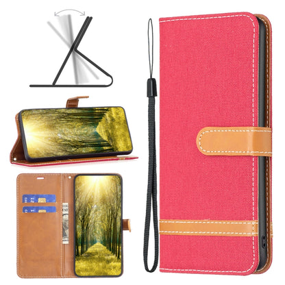 Red denim-texture leather folio phone case with wrist strap and card slot