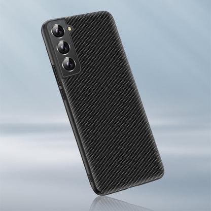 Black carbon-fiber texture phone case, rear view with triple-lens camera cutout