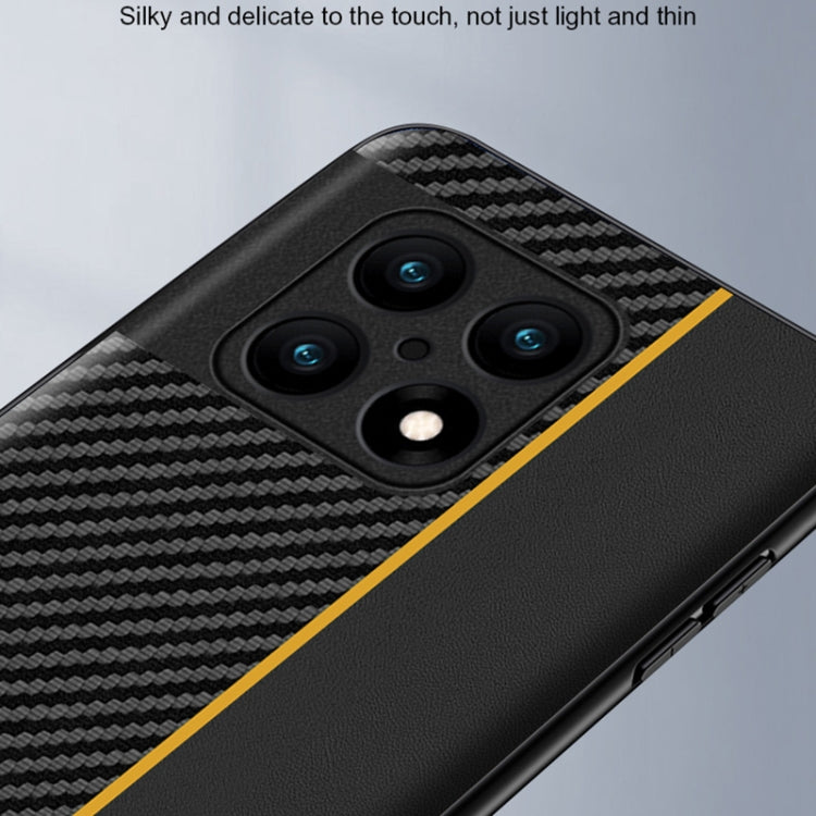 Black carbon fiber phone case with yellow stripe and four-camera lens openings