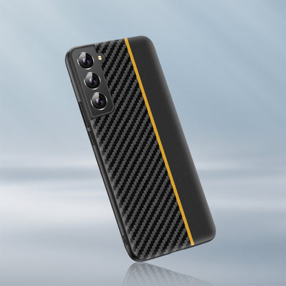 Ultra-thin phone case with black carbon fiber texture and yellow stripe; camera lenses visible