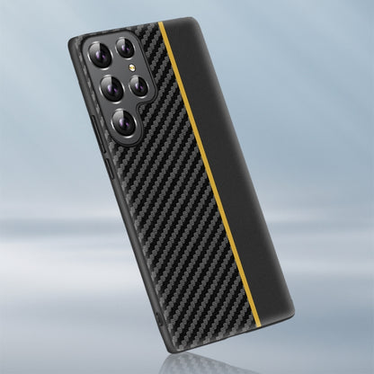 Ultra-thin phone case with black carbon fiber texture and yellow stripe; rear camera module