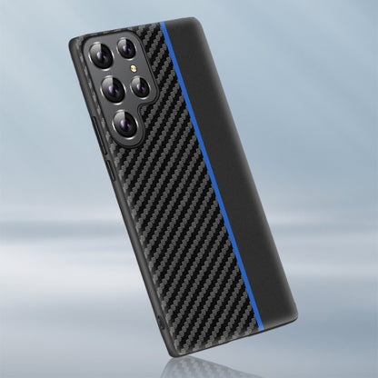 Black carbon fiber phone case with blue accent stripe, camera lenses visible