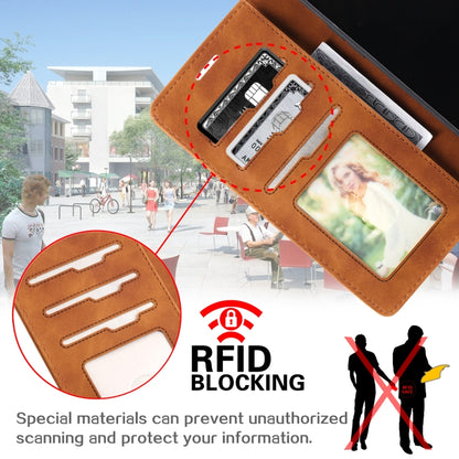 Brown leather wallet phone case with card slots and clear ID/photo window