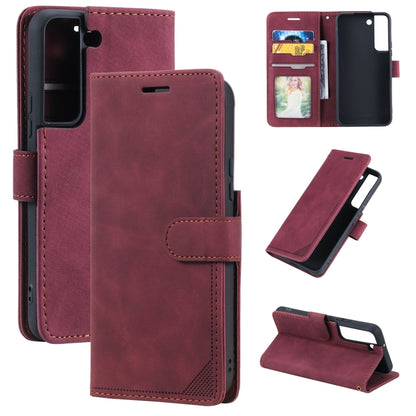 Burgundy leather wallet phone case with card slots and anti-theft strap, front view