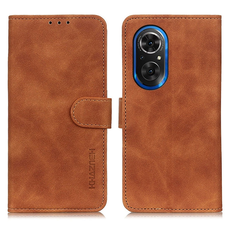 KHAZNEH retro texture flip leather phone case, brown, with front strap and logo.