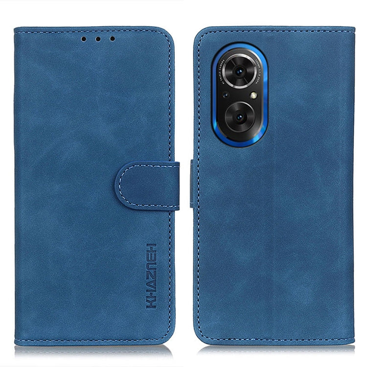 KHAZNEH retro texture flip leather phone case, blue, with front strap and camera cutout.