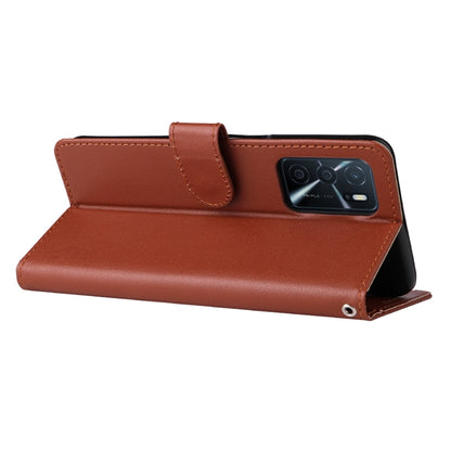 Brown leather folio phone case with camera cutout and foldover stand