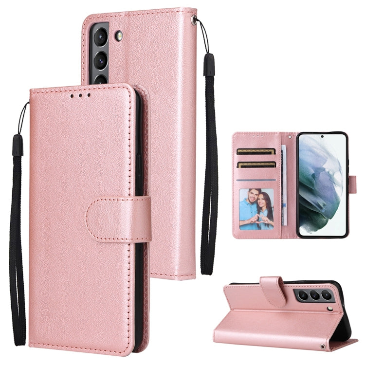 Rose pink leather-look phone wallet case with 3 card slots and snap closure, strap loop.