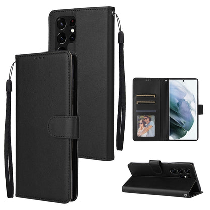 Black leather-look phone wallet case with 3 card slots and flip cover, strap attached.