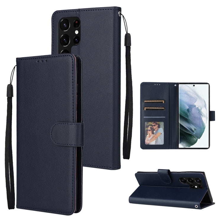 Deep navy leather phone case with three card slots and flip cover with wrist strap.