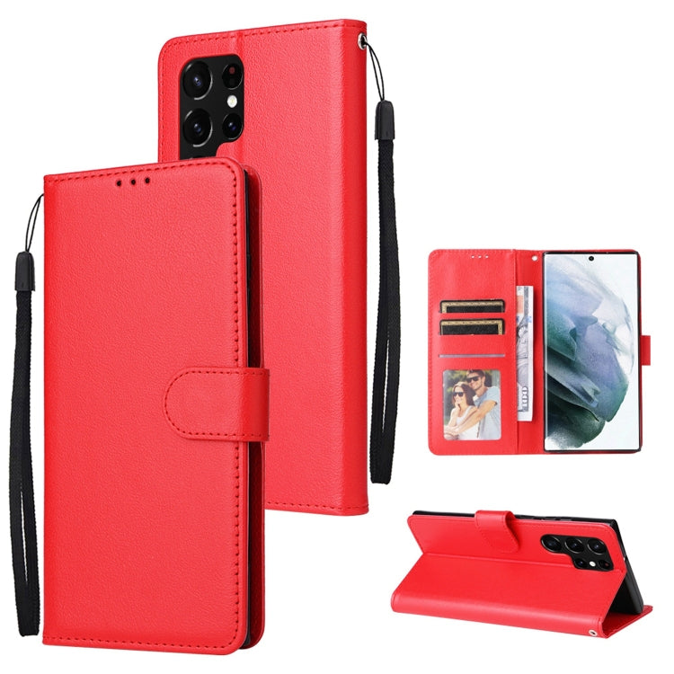 Red leather folio phone case with card slots and side lanyard strap